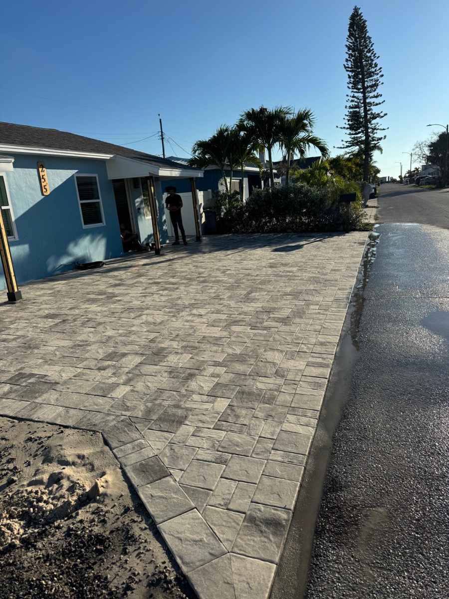Paver driveway running to the street